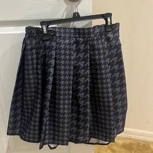 Pleated skirt black and grey scale